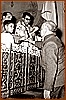 Pasquale Mazzeo ritira la tessera dell'ACLI da Padre Cerracchio - 1 maggio 1958.jpg