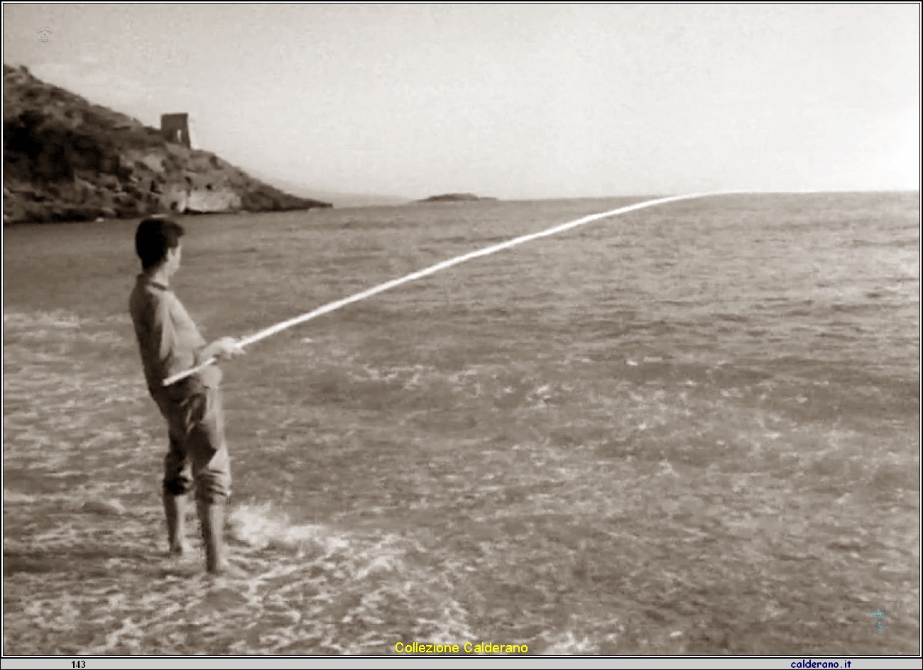 Pescatore con la canna sulla spiaggia del Porto.jpeg