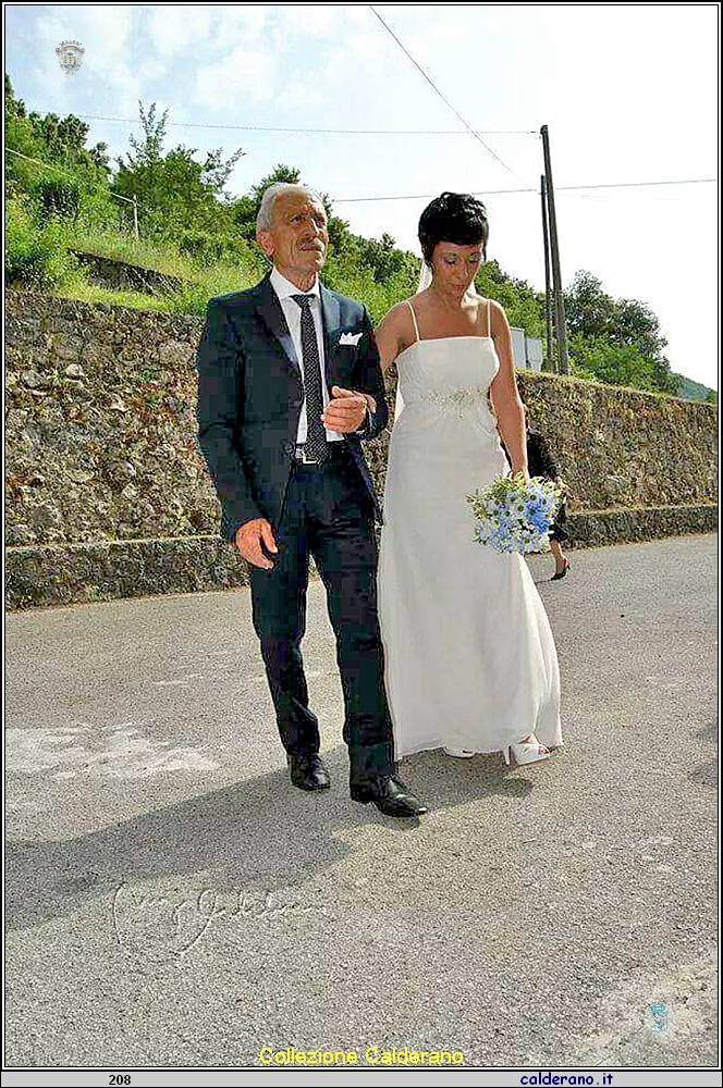 Marianna Trotta Curzo con il padre il giorno del matrimonio.jpg